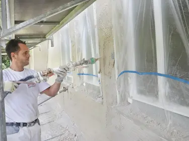 Processing on the exterior façade of a project in Tübingen.