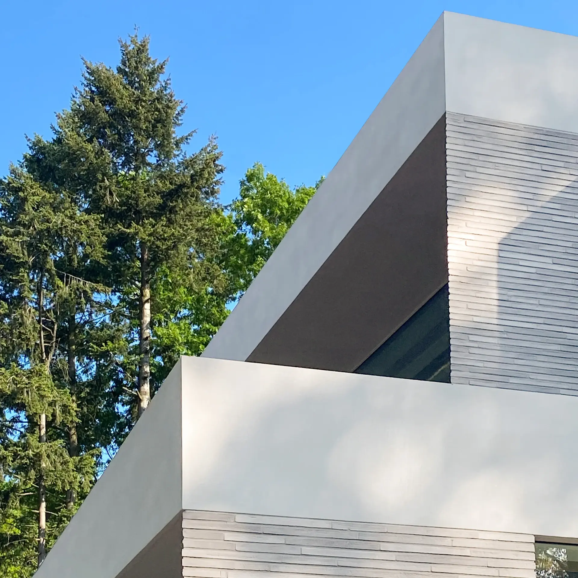 Präziser Dachabschluss ohne Dachüberstand bei Flachdach mit RoofEtics Dachsystem für eine klarer Fassadenlinie 