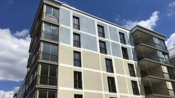 Wohnüberbauung mit Dämmfassade aus Aqua PuraVision System