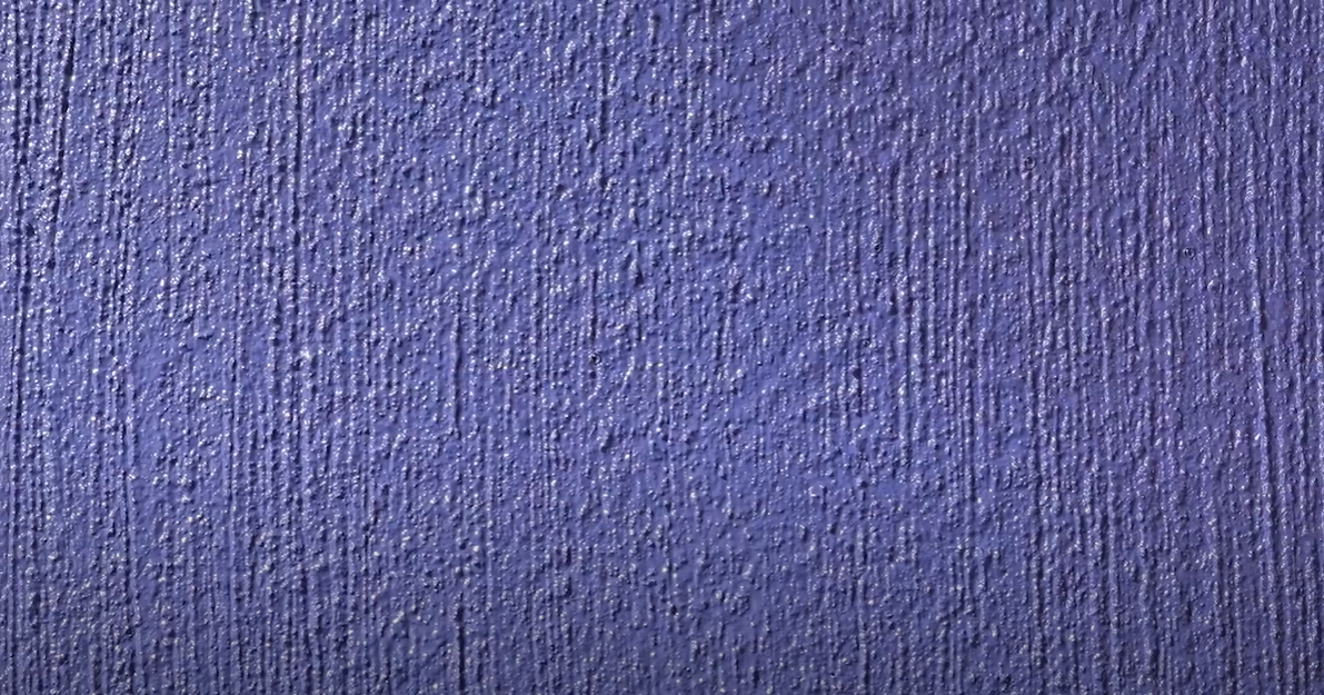 Verputzte Wand mit Design