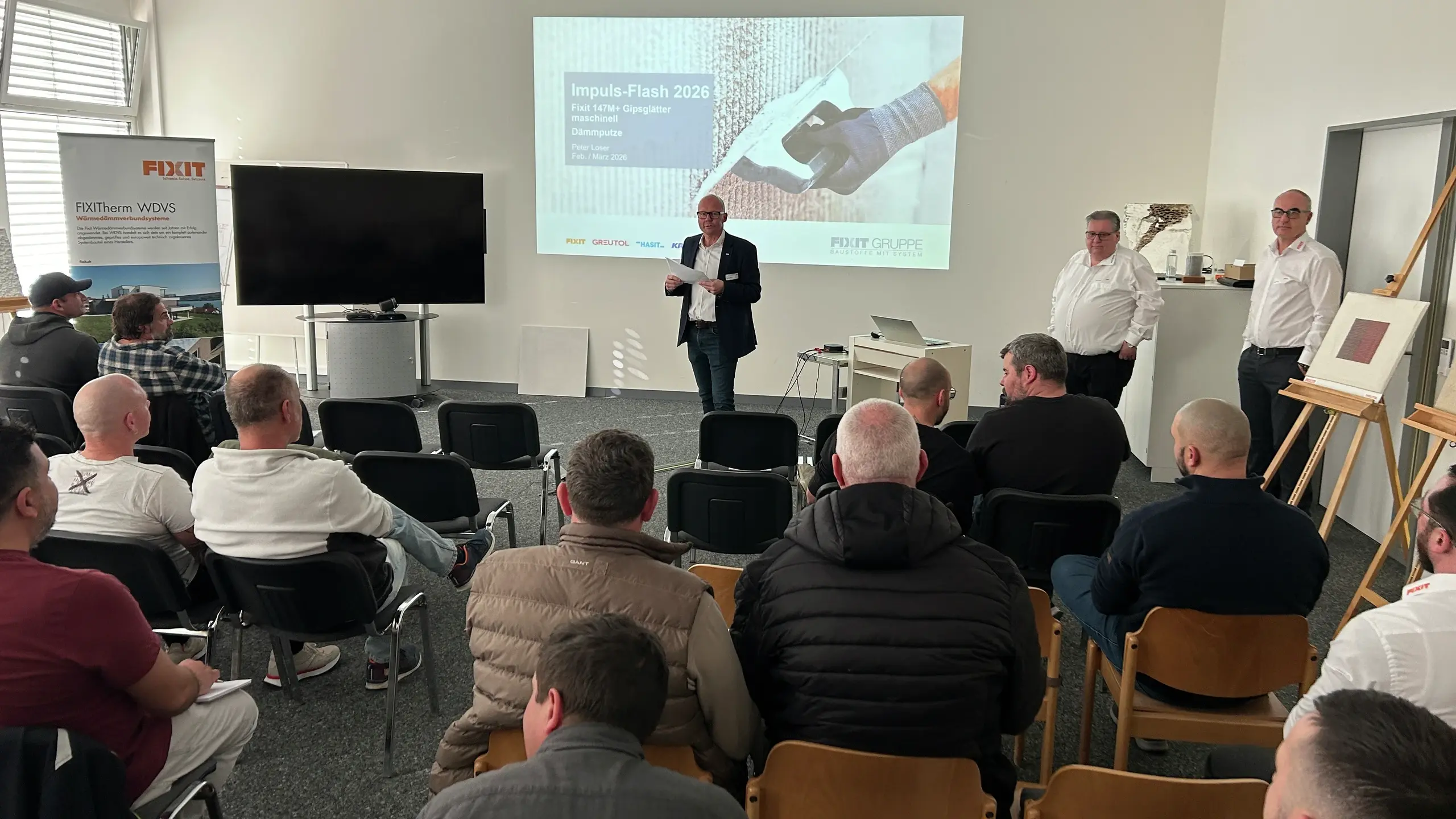 René Kuster begrüsst gemeinsam mit Peter Werner Wälle und Peter Loser die Teilnehmenden am Impuls-Vortrag