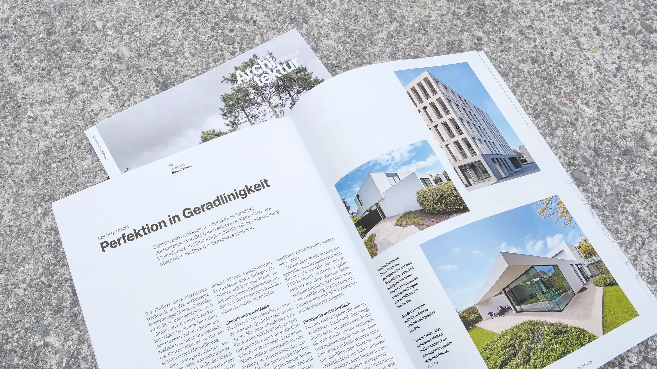 Magazin Architektur+Technik liegt mit dem Bericht zu Fixit RoofEtics® aufgeklappt auf dem Betonboden