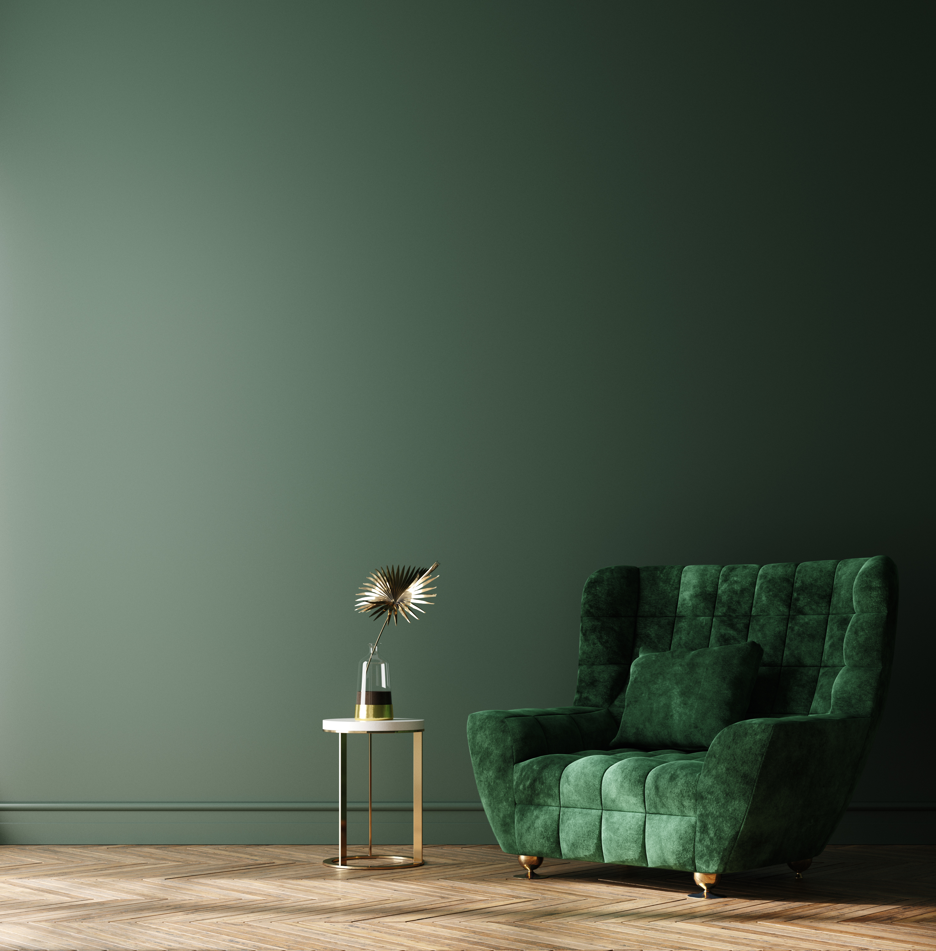 Grüne Wand mit grünem Sessel im Vordergrund