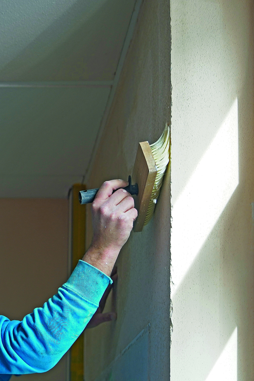  Worker applies solidifier 