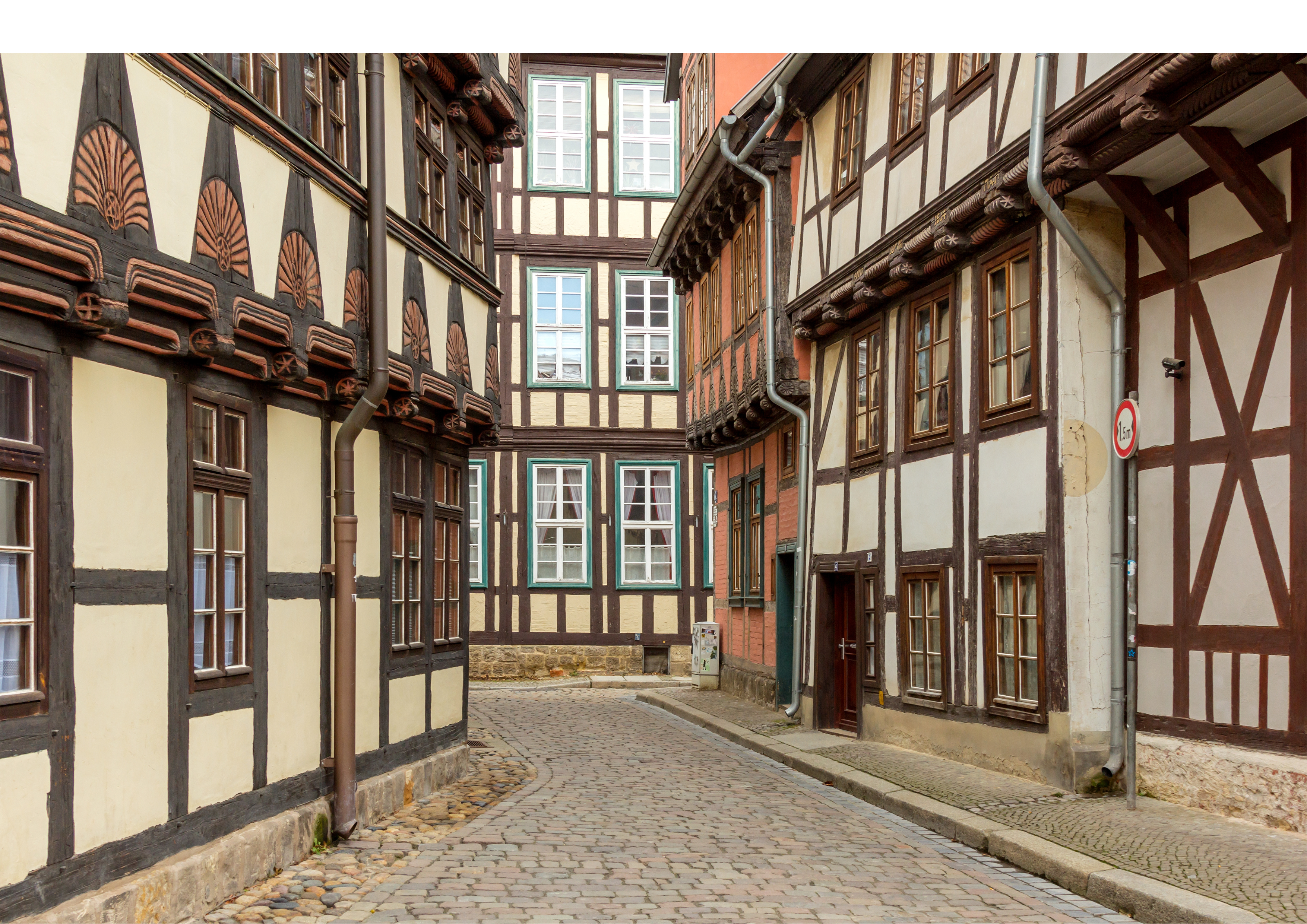 Renovated and insulated half-timbered houses in a street