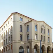 Außenperspektive der Fassade der Münzarkaden